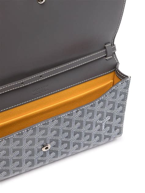 farfetch Goyard clutch bags